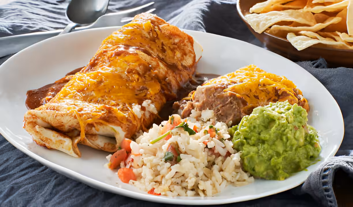 Cheesy Beefy Burrito Delight with Salsa and Sour Cream
