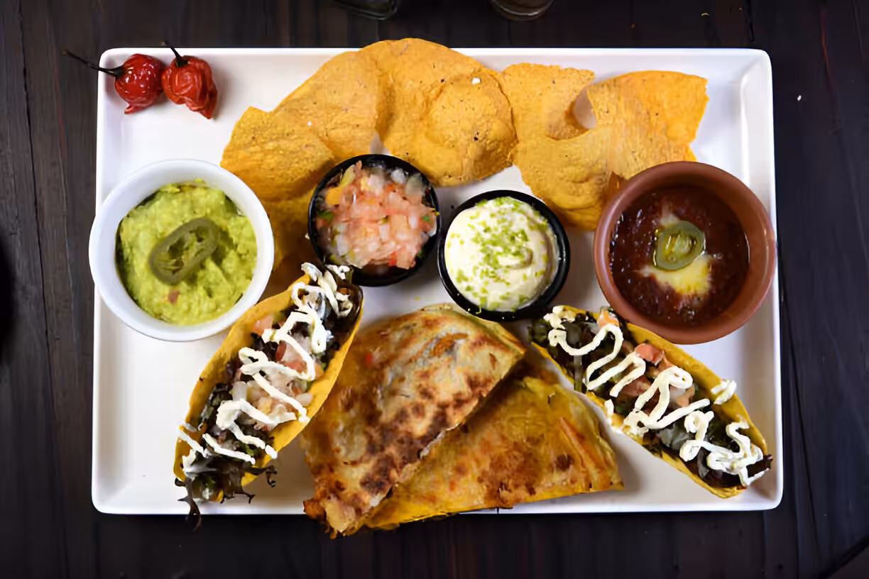 Cheesy Beefy Burrito Delight with Salsa and Sour Cream