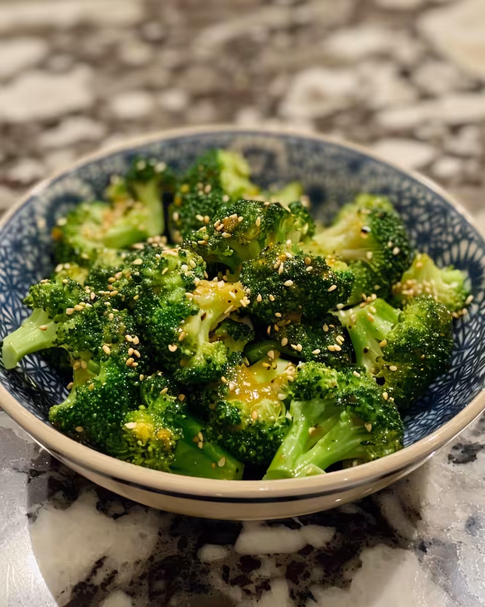 Ingredient spread including broccoli, cranberries, toasted sunflower seeds, cheddar, and dressings