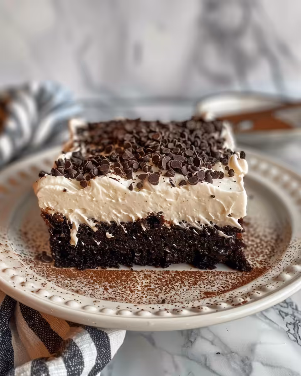 Final Irish Cream Poke Cake sliced and ready to serve
